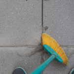 Sweeping jointing compound into paving gaps