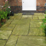 clean algae on your patio